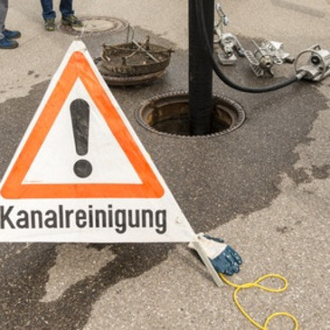 Warndreieck Kanalreinigung